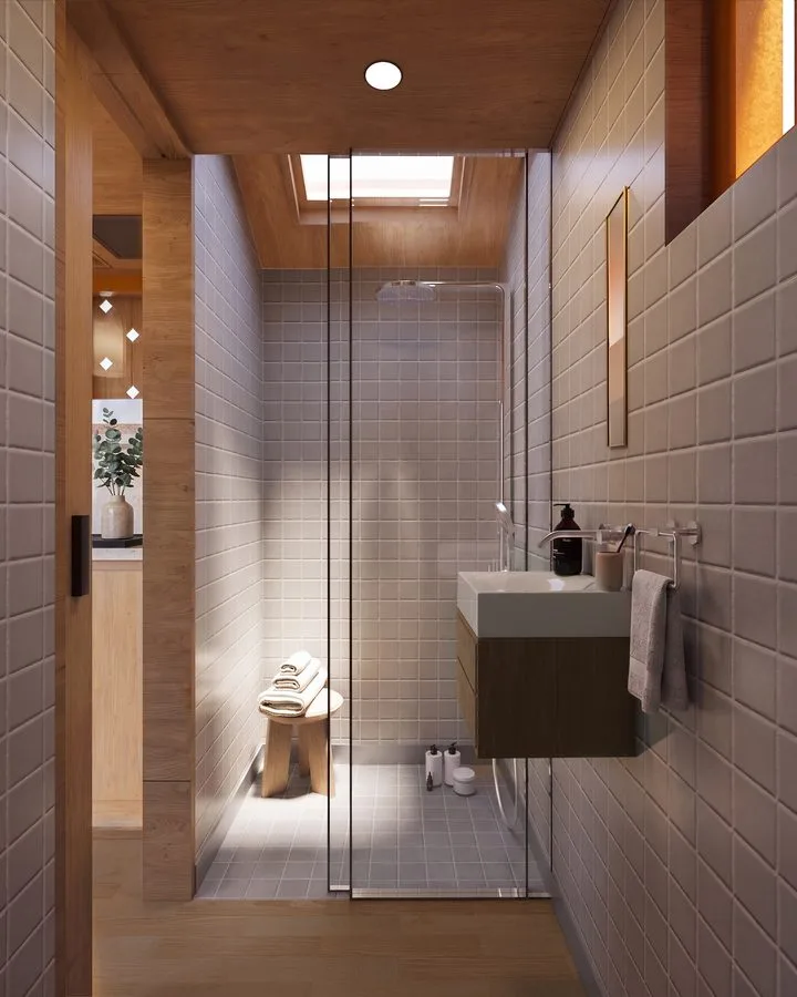 Render of the THOW 2: bathroom with warm beige tiles, rooflight above the shower, green vanity and timber door