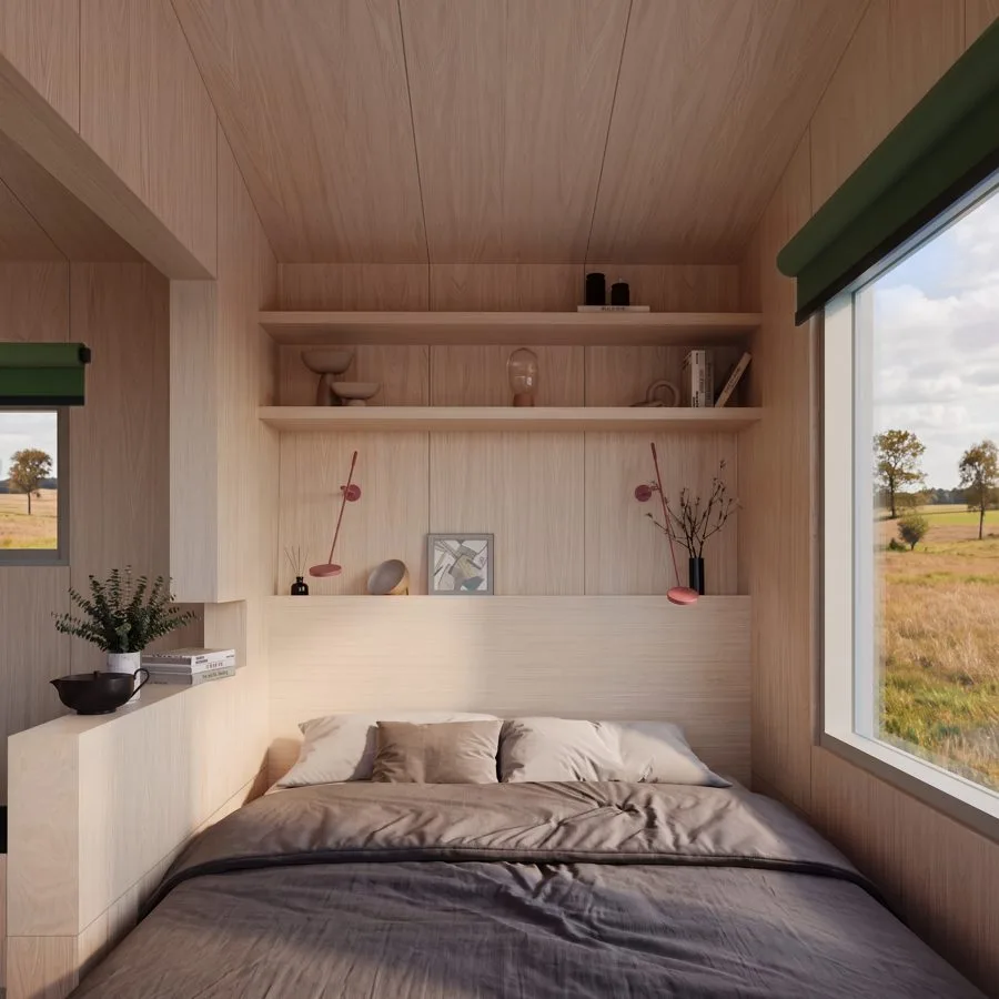 Render of the THOW 3: sleeping nook with shelves and window looking out over a golden field