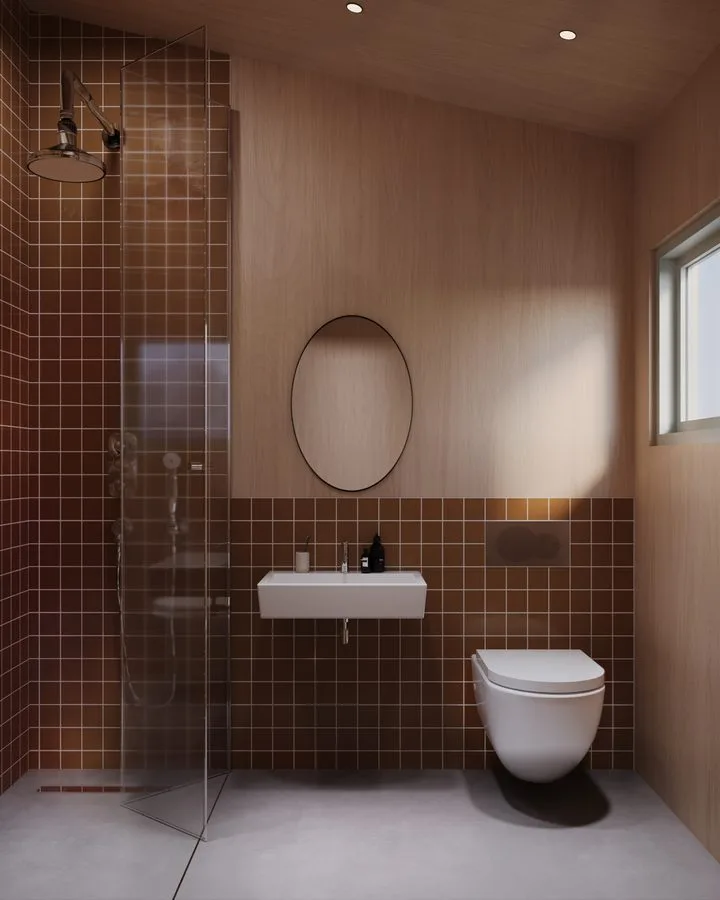 Render of the THOW 3: bathroom with oxblood-red tiled shower wall, oval mirror, white basin and WC